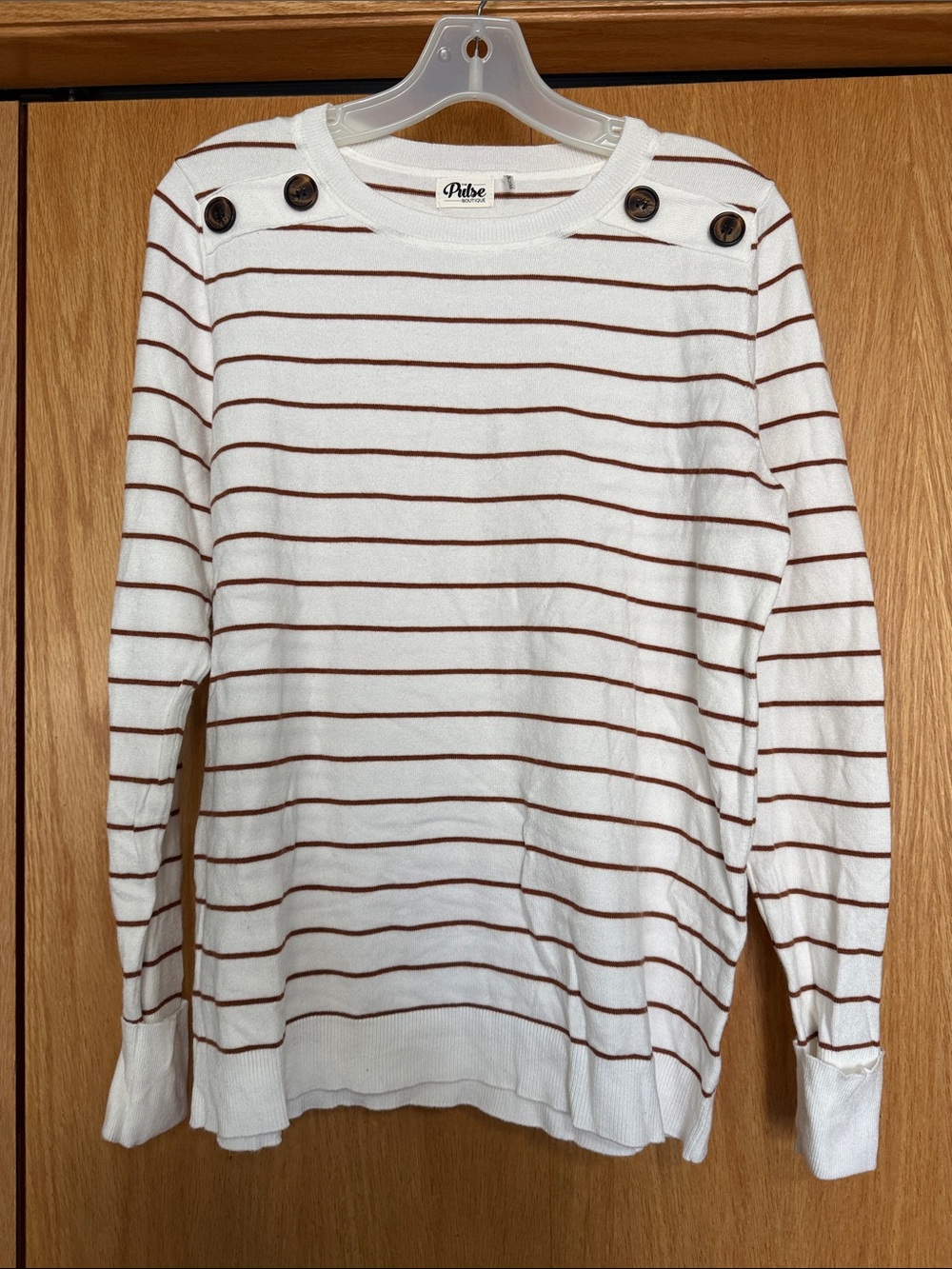 White Crewneck Sweater with Brown Stripes and Shoulder Buttons